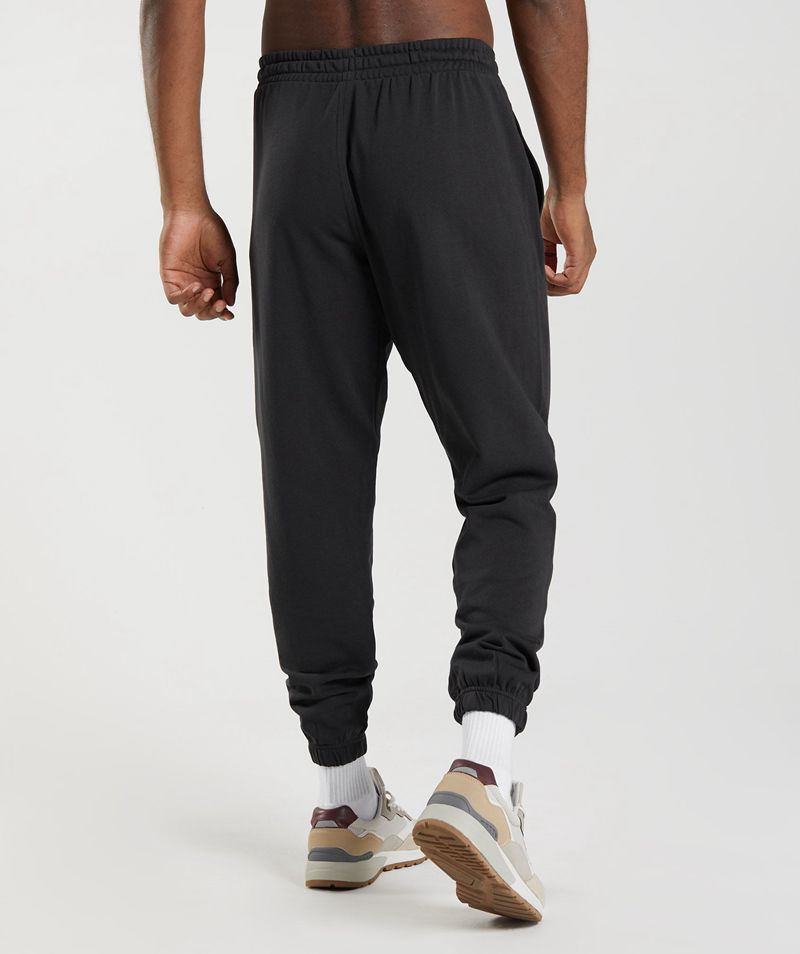 Men's Gymshark Essential Oversized Joggers Black | USA  8063-BEPXZ